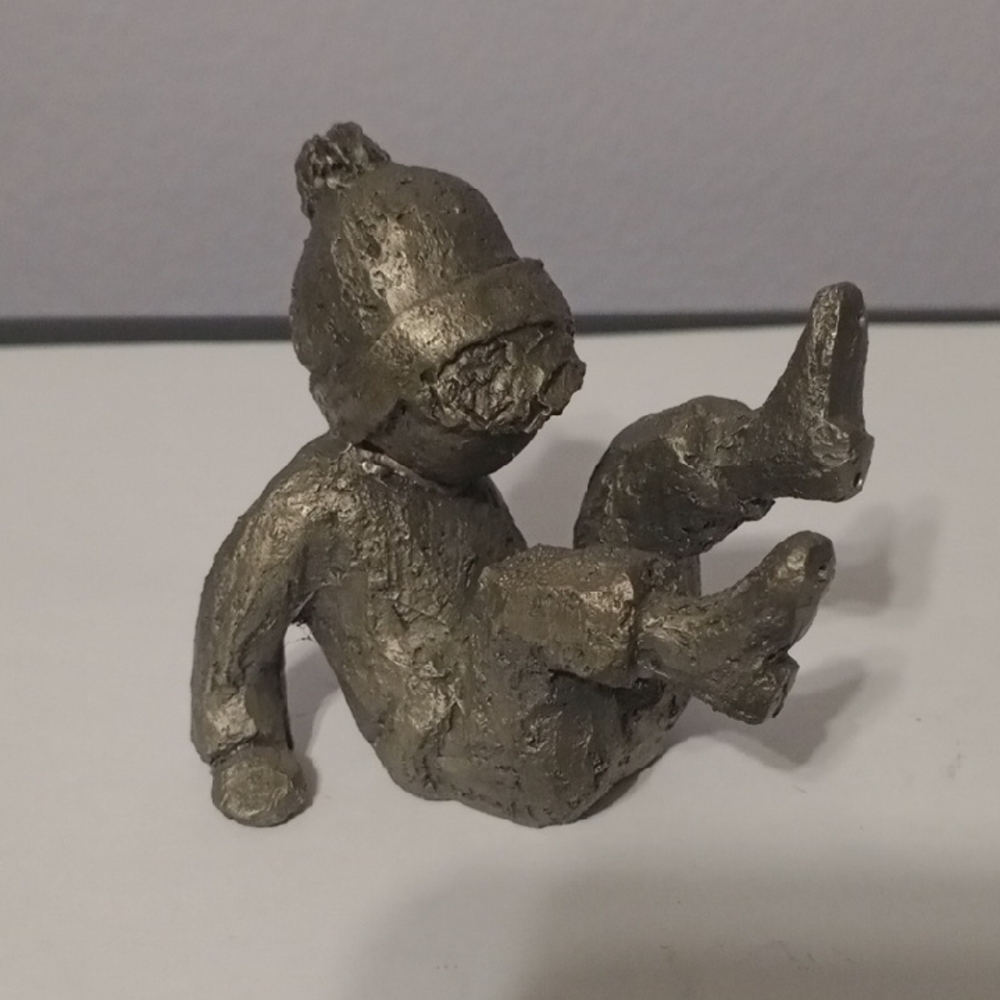 Handcrafted Silver-Tone Sitting Child Sculpture - Decorative Home Art